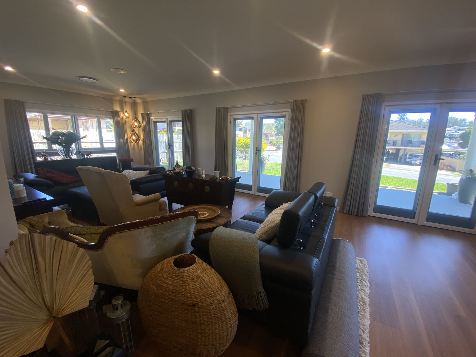 Curtains on French doors in a family living room